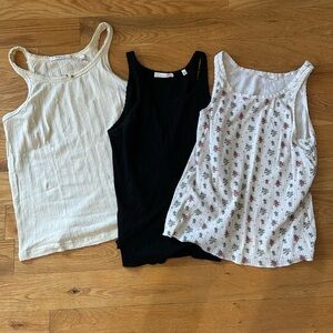 Barely used Doen tanks…30 each or 3 for 75. Each has been worn 1-2 times!